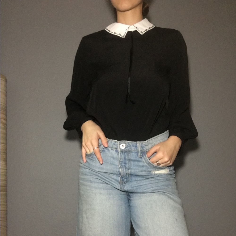 Sequined Peter Pan colored black blouse